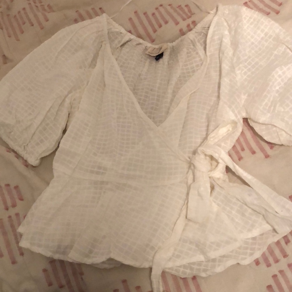 Puff sleeve peplum wrap top